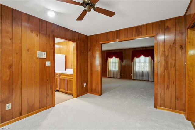 1365 Old Buckroe Rd, Hampton, VA 23663 - unfurnished room with a ceiling fan, wooden walls, and light carpet