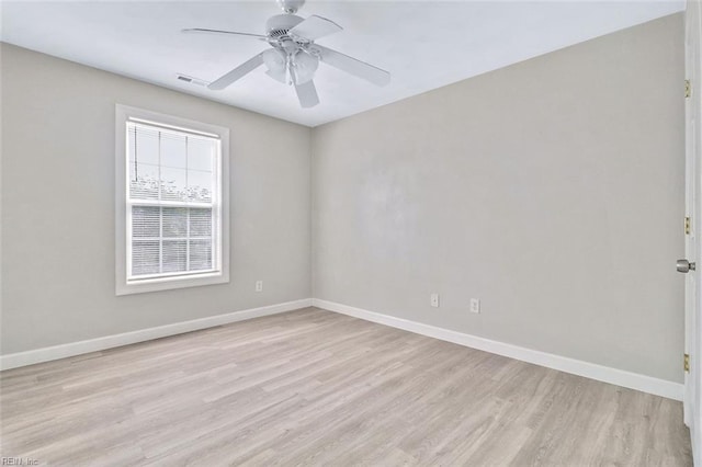 2100 Ruth St, Chesapeake, VA 23324 - spare room featuring light wood finished floors, baseboards, and a ceiling fan