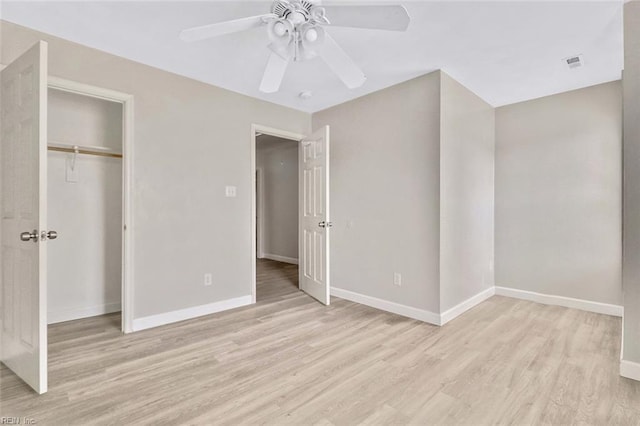 2100 Ruth St, Chesapeake, VA 23324 - unfurnished bedroom with light wood-style floors, baseboards, a closet, and ceiling fan