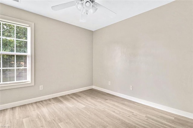 2100 Ruth St, Chesapeake, VA 23324 - unfurnished room with light wood finished floors, baseboards, and a ceiling fan
