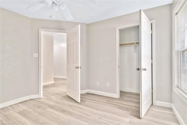 2100 Ruth St, Chesapeake, VA 23324 - unfurnished bedroom featuring light wood-style floors, baseboards, and ceiling fan