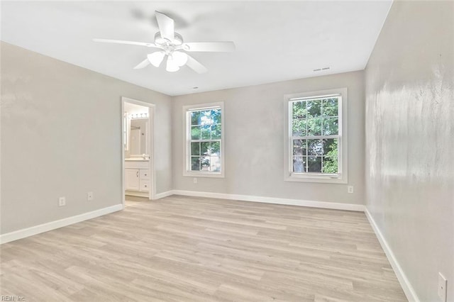 2100 Ruth St, Chesapeake, VA 23324 - unfurnished room featuring a ceiling fan, light wood finished floors, and baseboards