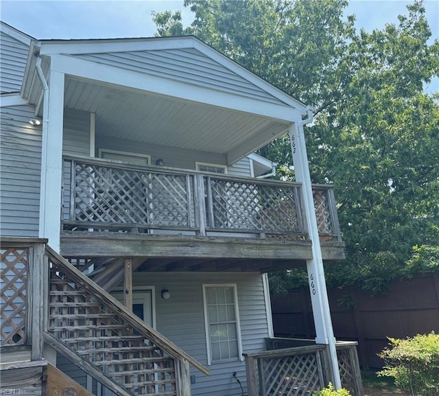 back of house with stairway