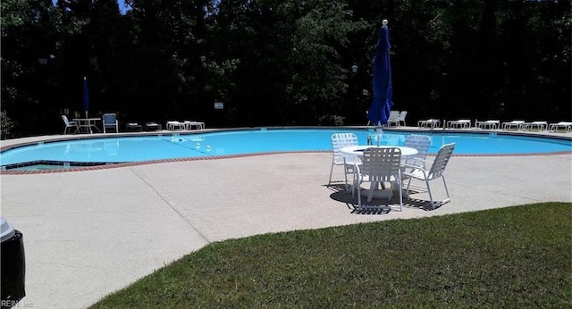 pool featuring a patio area
