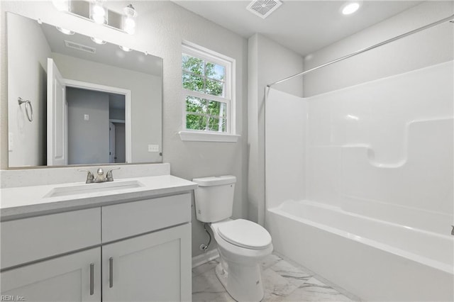bathroom with vanity, marble finish floor, toilet, and visible vents
