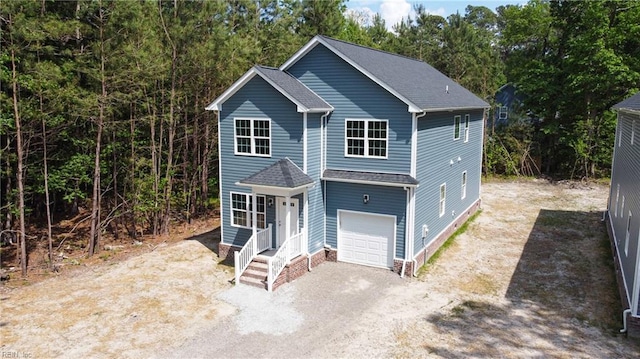 view of front of property with an attached garage and driveway