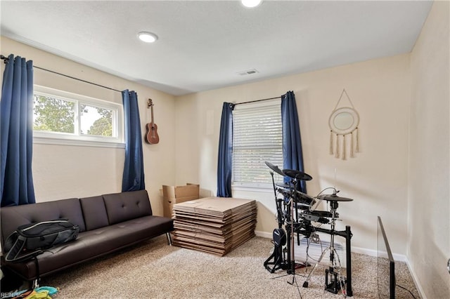 interior space with baseboards and visible vents
