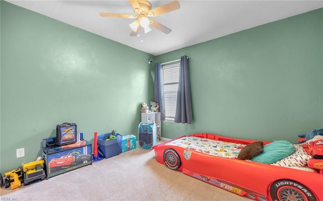 carpeted bedroom featuring ceiling fan