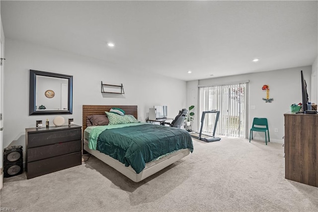 bedroom with carpet floors, access to outside, and recessed lighting
