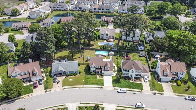 aerial view featuring a water view and a residential view