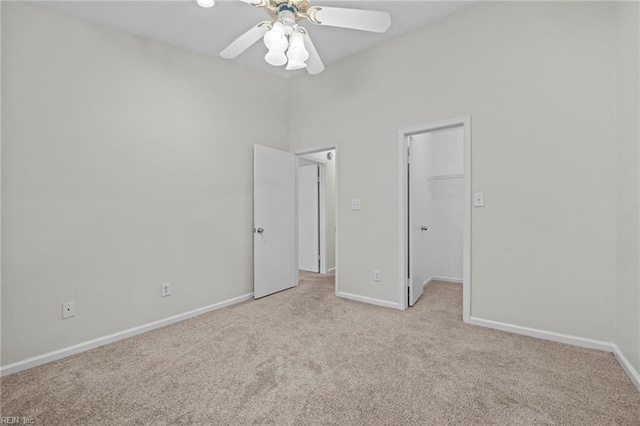 1615 Colonnade Cres, Virginia Beach, VA 23451 - unfurnished bedroom featuring light carpet, a walk in closet, baseboards, and a ceiling fan