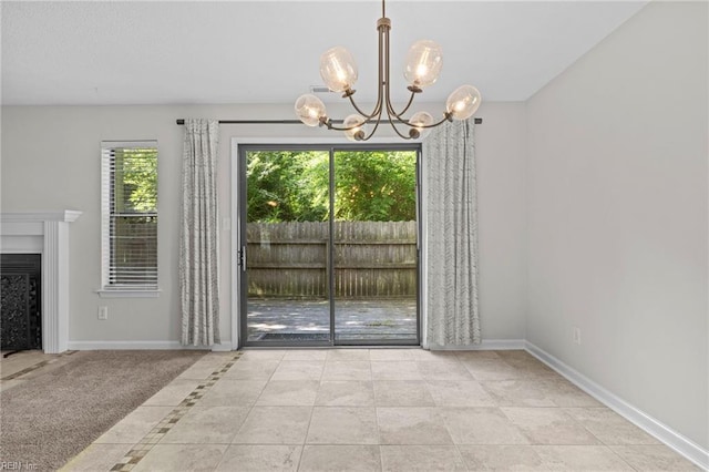 1615 Colonnade Cres, Virginia Beach, VA 23451 - unfurnished dining area featuring a chandelier, baseboards, tile patterned floors, and a fireplace