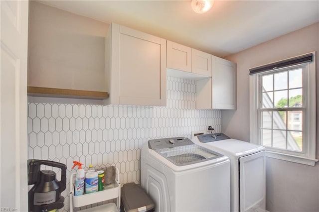 laundry room with cabinet space and washer and dryer