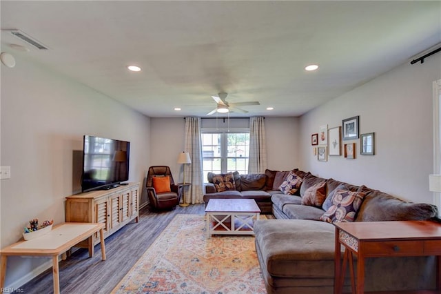 living room featuring ceiling fan, recessed lighting, wood finished floors, and visible vents