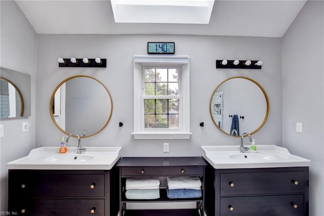 full bathroom with two vanities and a sink