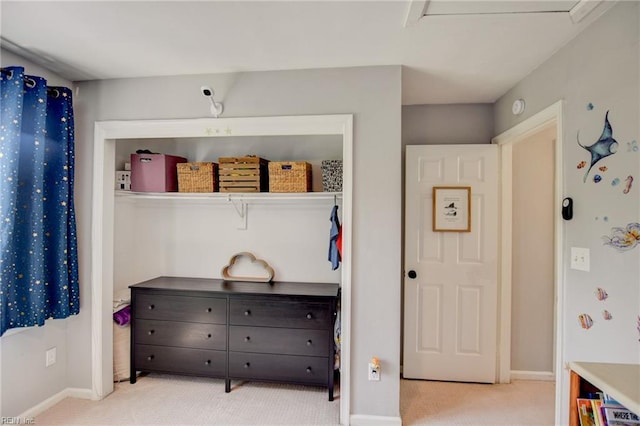 carpeted bedroom with baseboards