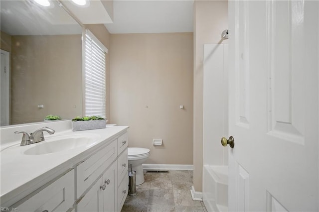 bathroom with visible vents, a shower, baseboards, vanity, and toilet
