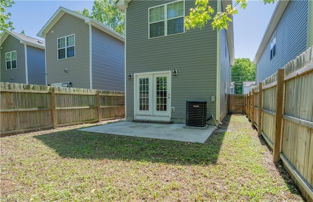 810 Fairland Ave, Hampton, VA 23661 - rear view of house featuring a fenced backyard, a lawn, a patio, and cooling unit