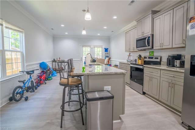 810 Fairland Ave, Hampton, VA 23661 - kitchen with a sink, gray cabinets, a healthy amount of sunlight, and stainless steel appliances