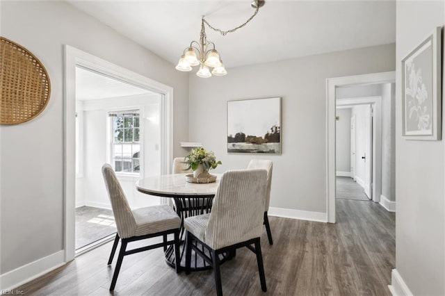 1312 E Norcova Dr, Norfolk, VA 23502 - dining space with baseboards, wood finished floors, and a chandelier