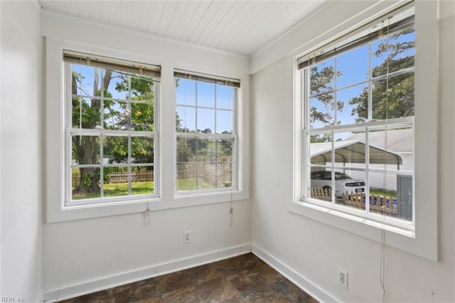 1312 E Norcova Dr, Norfolk, VA 23502 - empty room featuring baseboards, stone finish flooring, and a wealth of natural light