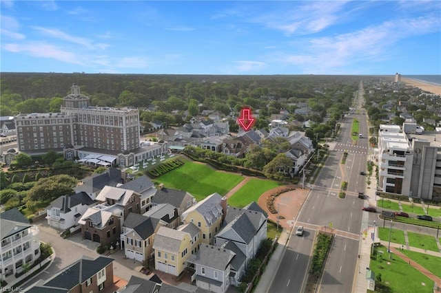birds eye view of property with a residential view