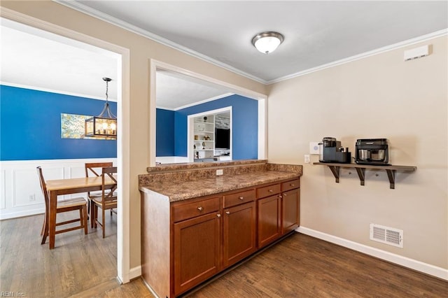 5013 Finn Rd, Virginia Beach, VA 23455 - kitchen featuring visible vents, dark wood finished floors, brown cabinets, a notable chandelier, and ornamental molding