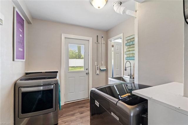 5013 Finn Rd, Virginia Beach, VA 23455 - laundry area featuring a sink, laundry area, independent washer and dryer, and wood finished floors