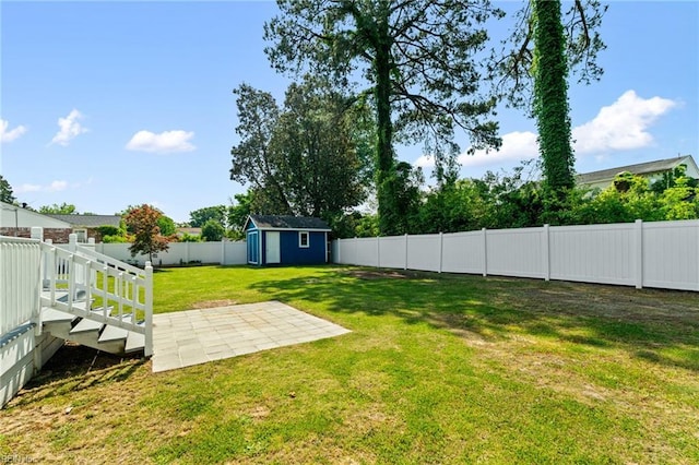 5013 Finn Rd, Virginia Beach, VA 23455 - view of yard featuring a fenced backyard, an outbuilding, a patio area, and a shed