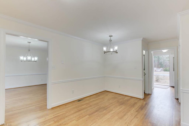 106 Running Man Trl, Yorktown, VA 23693 - unfurnished dining area with an inviting chandelier, baseboards, ornamental molding, and light wood finished floors