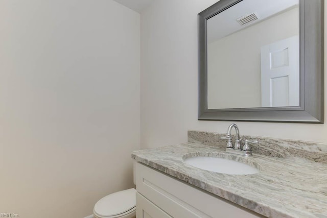 106 Running Man Trl, Yorktown, VA 23693 - half bath with visible vents, baseboards, toilet, and vanity