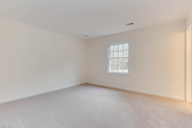 106 Running Man Trl, Yorktown, VA 23693 - unfurnished room with baseboards, light carpet, and visible vents