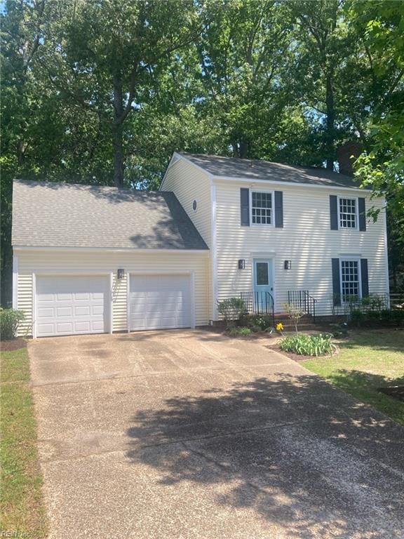 106 Running Man Trl, Yorktown, VA 23693 - colonial-style house with an attached garage and driveway