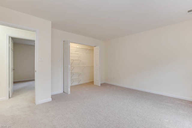 106 Running Man Trl, Yorktown, VA 23693 - unfurnished bedroom with baseboards and light carpet
