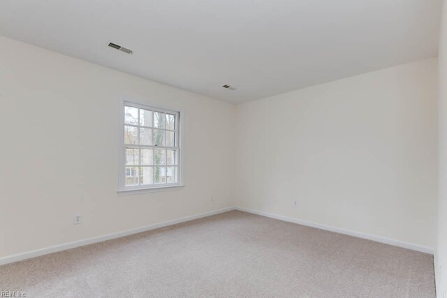 106 Running Man Trl, Yorktown, VA 23693 - empty room featuring visible vents, baseboards, and light carpet