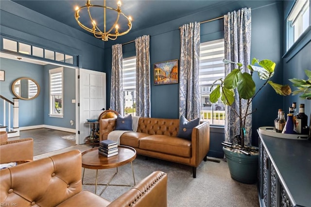 2245 Chamberino Dr, Virginia Beach, VA 23456 - living room featuring baseboards and a chandelier