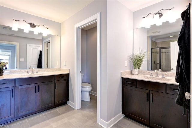 4217 Greenview Aly, Williamsburg, VA 23188 - full bathroom with a sink, baseboards, a stall shower, and two vanities