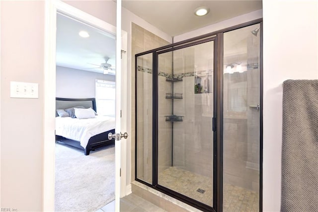 ensuite bathroom with ceiling fan, a stall shower, tile patterned floors, ensuite bathroom, and recessed lighting
