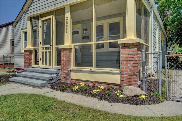 2622 Harrell Ave, Norfolk, VA 23509 - view of home's exterior with fence and brick siding