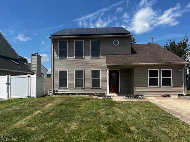 1761 Gravenhurst Dr, Virginia Beach, VA 23464 - traditional-style house featuring solar panels and a gate