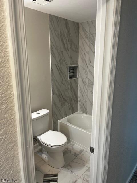1761 Gravenhurst Dr, Virginia Beach, VA 23464 - full bath featuring toilet, marble finish flooring, and bathing tub / shower combination