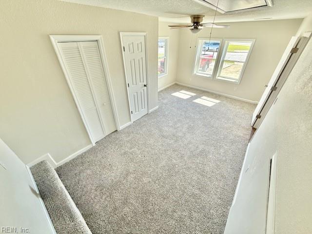 1761 Gravenhurst Dr, Virginia Beach, VA 23464 - unfurnished dining area with attic access, carpet floors, baseboards, and ceiling fan
