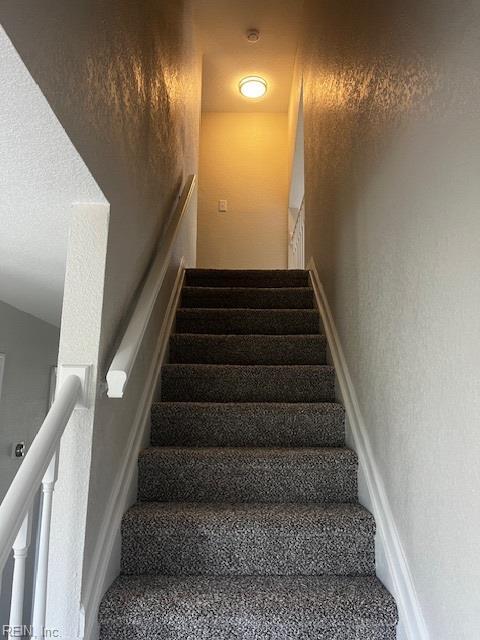 1761 Gravenhurst Dr, Virginia Beach, VA 23464 - stairs featuring baseboards