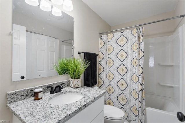 full bathroom featuring toilet, shower / tub combo with curtain, and vanity