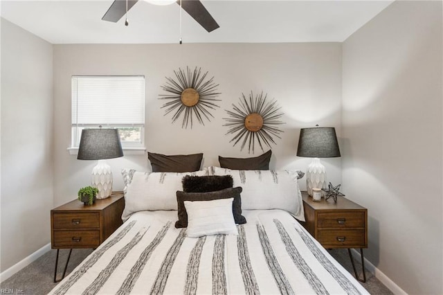 bedroom featuring baseboards, ceiling fan, and carpet floors