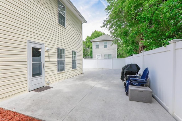 view of patio / terrace featuring a fenced backyard and area for grilling