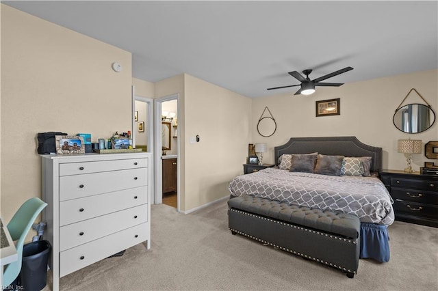 bedroom with baseboards, ceiling fan, and light carpet