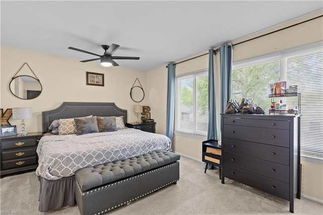 bedroom featuring carpet flooring, baseboards, and ceiling fan