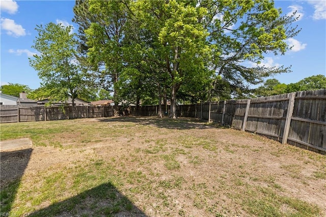 view of yard featuring a fenced backyard