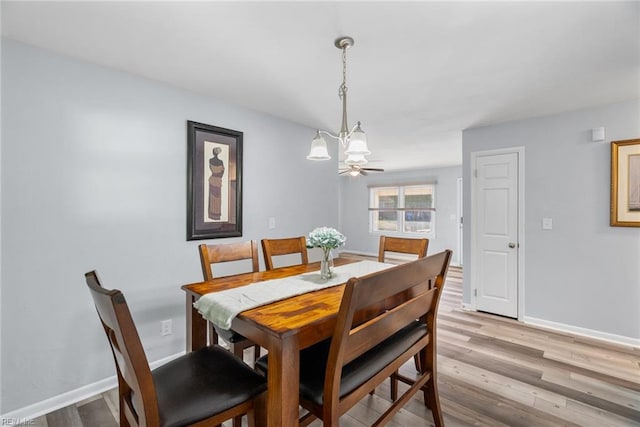 2050 Midway Ave, Chesapeake, VA 23324 - dining area featuring an inviting chandelier, baseboards, and light wood-style floors